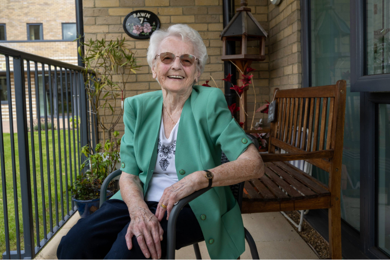 Bridgid sat outside her home for over 55s