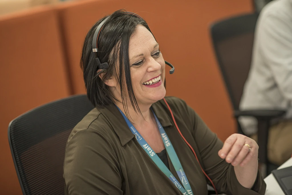 Welfare Benefits Team Leader, Debbie, on the phone to a customer