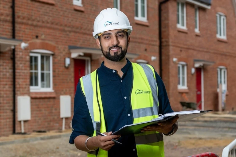 AJ, Clerk of Works, at a building site