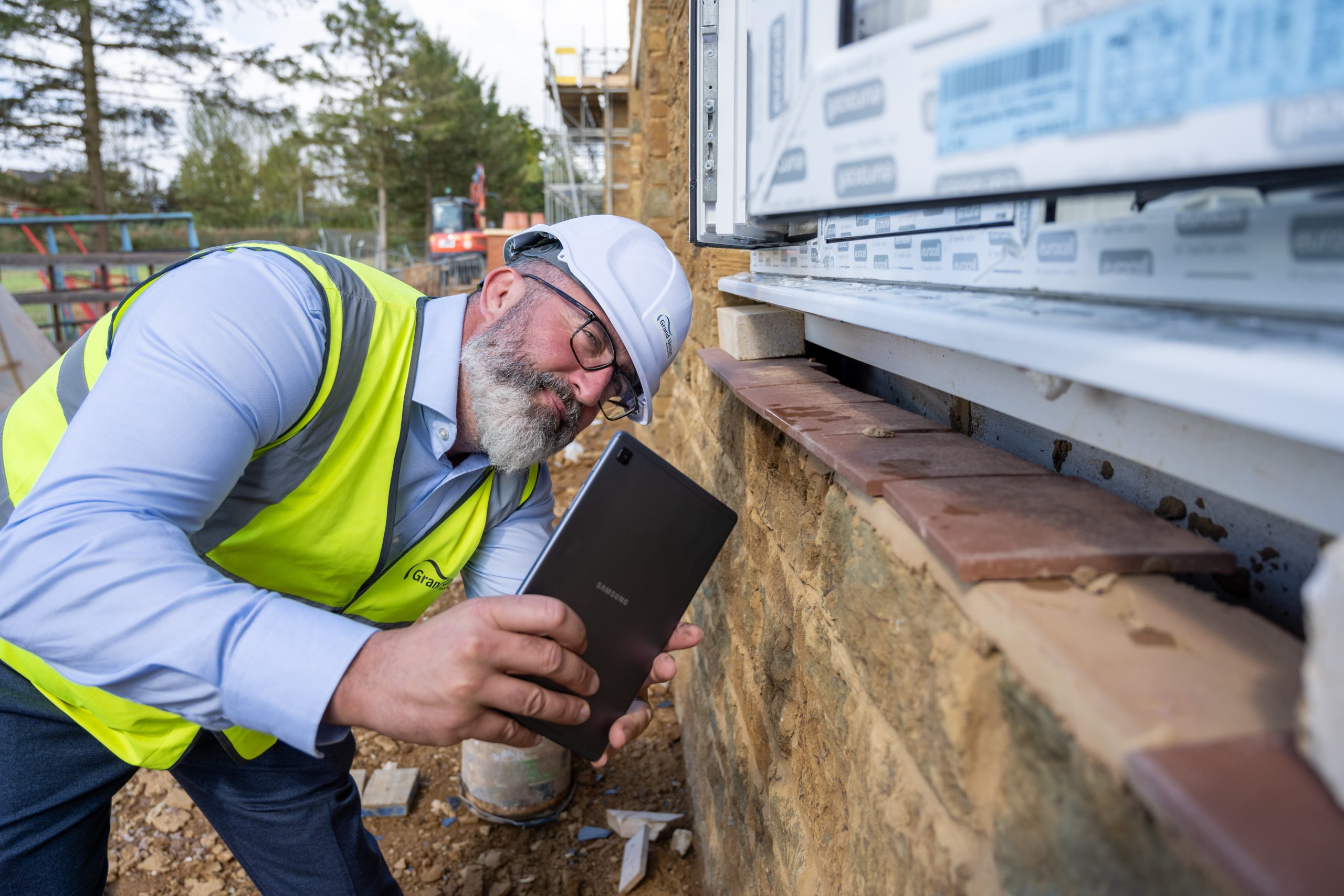 Chris inspecting exterior walls